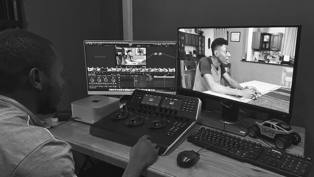 John Paul Mboira in a DaVinci Resolve color grading session in post-production